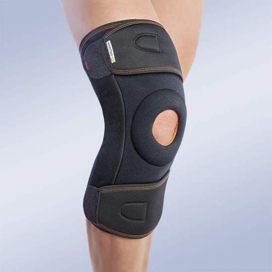 ENVELOPE KNEE PAD WITH POLYCENTRIC JOINTS