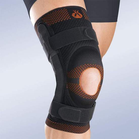 BREATHABLE ELASTIC KNEE PAD WITH OPEN ROTULA SILICONE IMPRESSION AND METALLIC STRIPS WITH POLYCENTRIC ARTICULATION 8107