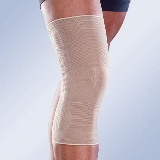 ELASTIC KNEE PAD WITH CLOSED ROTULA AND SIDE STABILIZERS 8102