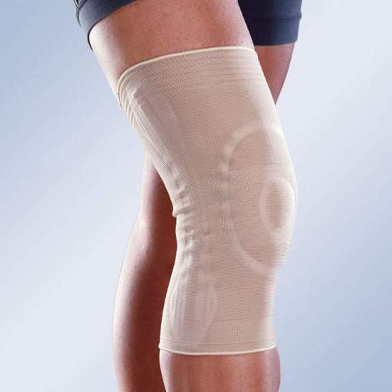 GINOCCHIO ELASTICO CON ROTULA CHIUSA, RODETTO IN SILICONE E STABILIZZATORI LATERALI 8103